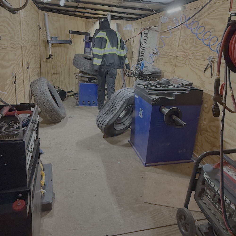 Technician performing a tire change in Murfreesboro, TN